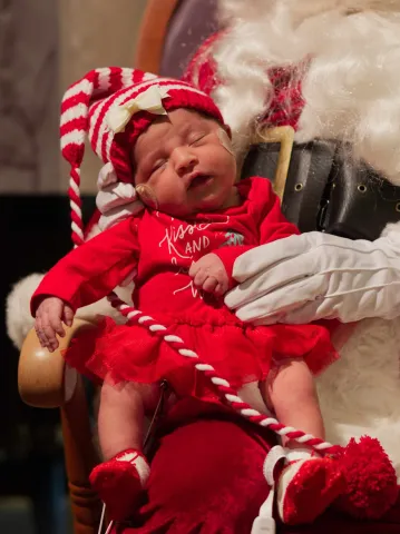 Baby Held By Santa