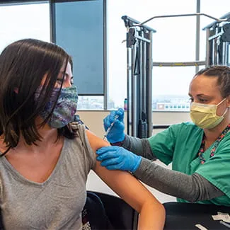 Denver Health Teams Up With DPS to Vaccinate Thousands of Teachers and Staff Against COVID-19